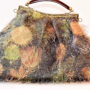 Large trapeze clutch bag with handle, brocade blue with flowers